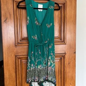 Green floral shorts romper. By Elevenses size Small
